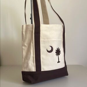 Cross Canvas Tote Bag with Moon Palm Tree Design tan brown